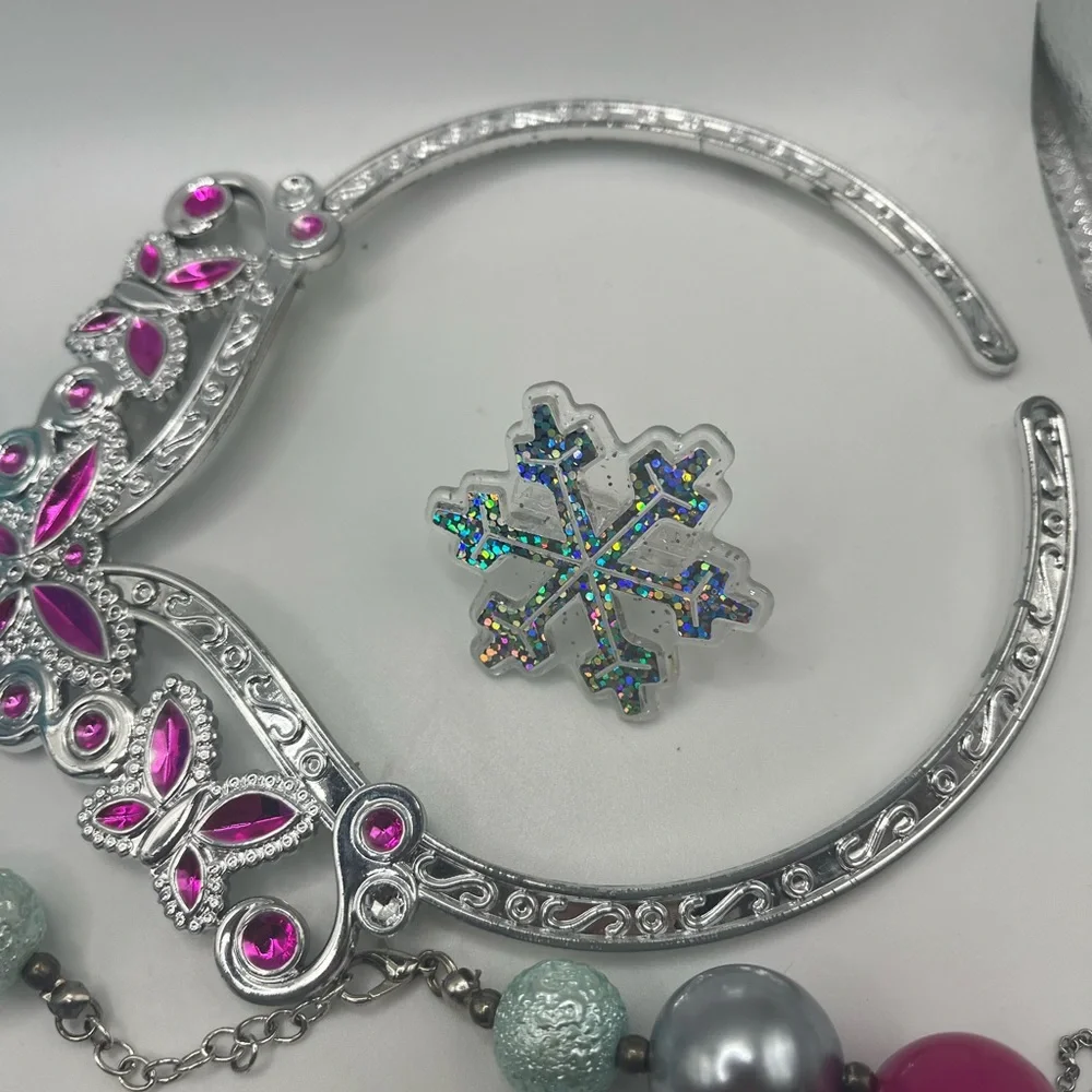 Lot of frozen jewelry from Disney!  Includes working watch